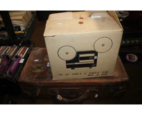 A VINTAGE SUITCASE TOGETHER WITH A SUPER-8 FILM PROJECTOR