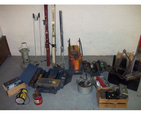 A SELECTION OF TOOLS TO INCLUDE TOOL BOXES, A WELDER, SKIS, A PARAFFIN HEATER, A FLYMO MOWER ETC.