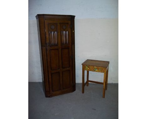 AN OAK WARDROBE AND A VINTAGE SCHOOL DESK.