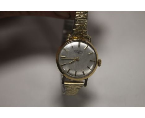 A ROTARY WRIST WATCH POSSIBLY 9 CT