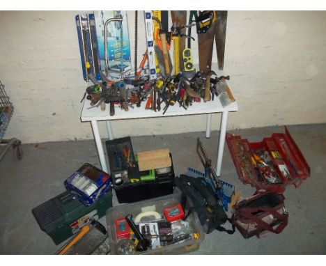 A SELECTION OF TOOLS AND TOOL BOXES.