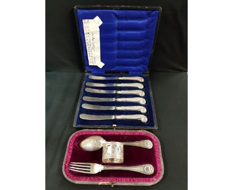 CASED SILVER CHRISTENING SET - FORK, SPOON AND NAPKIN RING MAPPIN AND WEBB TOGETHER WITH SET OF SILVER PISTOL GRIP HANDLED KN