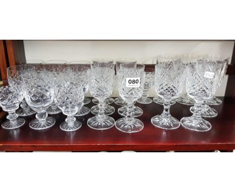 SHELF LOT OF WINE GLASSES 