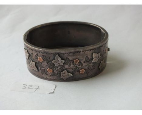 Antique silver hinged bangle decorated with leaf‘s   