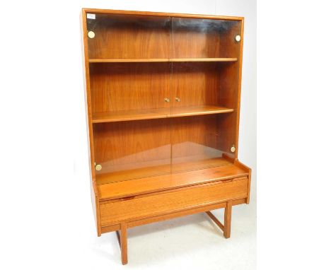 Turnidge Furniture - A 1960's retro vintage Turnidge teak wood mirror backed glass display cabinet having twin glazed sliding