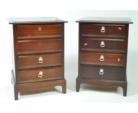 Stag - Minstrel Range - Two late 20th century Makore wood bedside chest of drawers. Flared top with a bank of four drawers. R