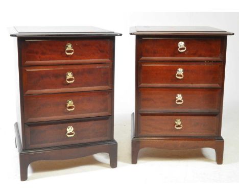 Stag - Minstrel Range - Two late 20th century Makore wood bedside chest of drawers. Flared top with a bank of four drawers. R