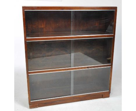 Minty, Oxford - A vintage 20th century hardwood stacking barrister's bookcase / shelf. Modular five shelf system, with twin s