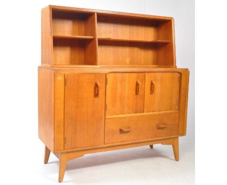 E. Gomme- G Plan - Brandon Range - A retro vintage 20th Century light oak sideboard. The top with upright gallery back having