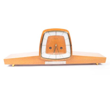 Mauthe - A 20th century circa 1960s teak mantel clock. The clock being of tamobour type form with white chapter ring with gil