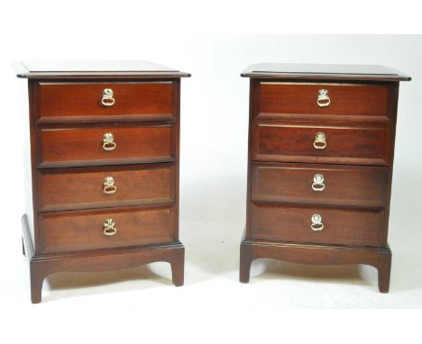 Stag Furniture- Minstrel Range - Two late 20th century Makore wood bedside chest of drawers. Flared top with a bank of four d