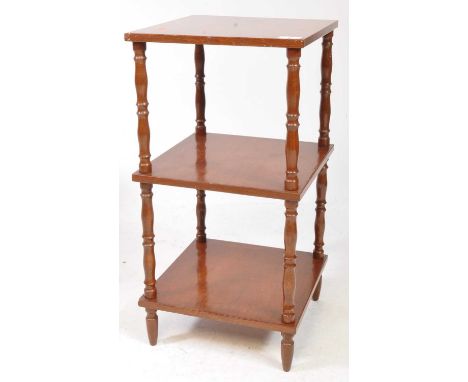 A vintage 20th century walnut three tier whatnot. Three square platforms with turned supports.66 x 33 x 33cm