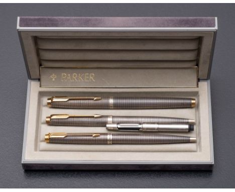 A Parker (USA) Sterling silver fountain pen and ball pen in Cisele pattern: and a matching French parker ball pen (3)  Duofol