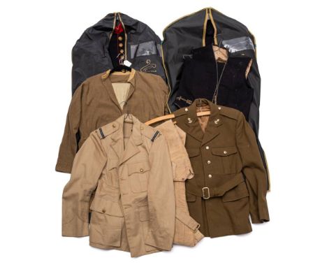 A collection of various uniform: to include an RAF tunic, Army Ordnance Corps jacket WWII pattern shirt, etc