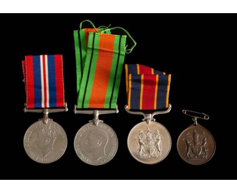 A Rhodesian Police Reserve Long Service Medal '5325M F/R H Von Memerty': together with a 1939-1945 World War Medal, War Medal