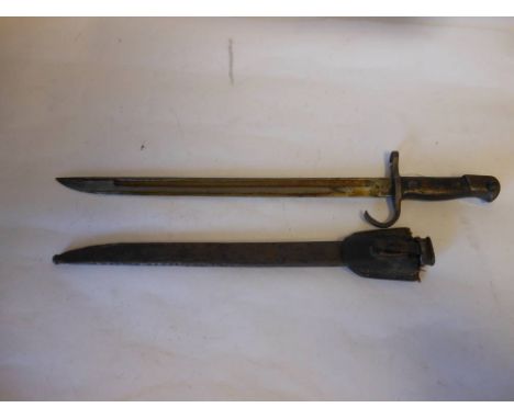 Japanese 30th Year type bayonet: with 40cm fullered blade, wood grips contained in a steel scabbard.  