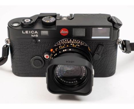 A Leica M6 Rangefinder Camera: serial number 1905058, black finish, fitted Summicron-M 1:2/35mm lens with hood in a Leica bla