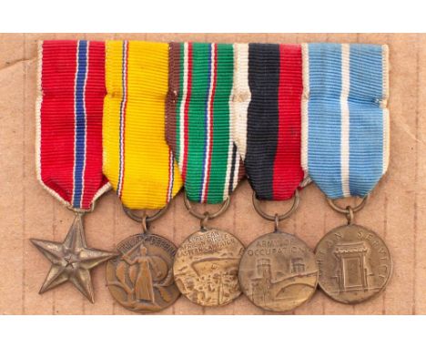 A group of five American miniature medals: includes WWII Bronze Star, American Defence Service Medal, European African Middle