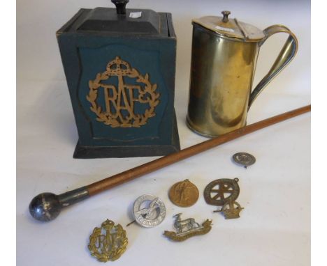 A  RAF painted wood tea caddy: with applied RAF cyphers, assorted cap badges, swagger stick and a trench art style lidded jug