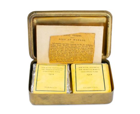 A 1914 Christmas Tin: containing original tobacco, cigarettes and greetings card, together with a newspaper cutting of the de