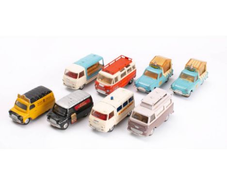 Corgi. An unboxed group of commercial vehicles: to include Commer Bus 'Holiday Camp Special', two Walls Ice Cream Vans, two C