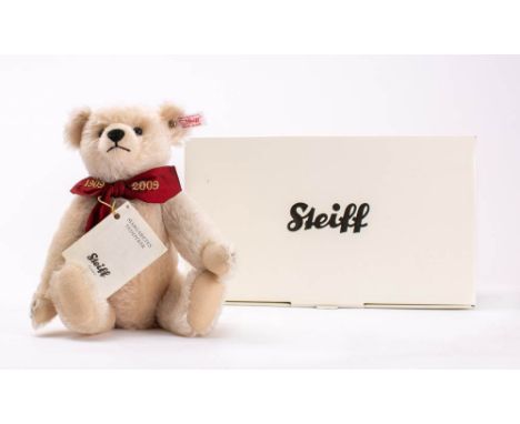 A Steiff  'Margaretes 1909-2009' white plush Teddy bear: stud and tag to ear with boot button eyes, stitched nose and mouth o