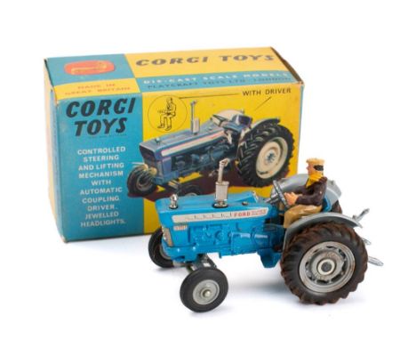 Corgi 67 Ford 5000 Super Major Tractor: blue, grey with painted driver and jeweled headlights, grey plastic hubs with treaded