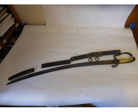 A George lll light cavalry sword: 74cm blued steel curved blade with royal cypher, ribbed grip and stirrup knuckle guard, con