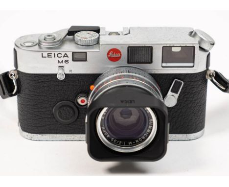 A Leica M6  Rangefinder camera: serial number 2331253, plated finish, fitted Summicron-M 1:2/35mm lens with hood in a Leica b