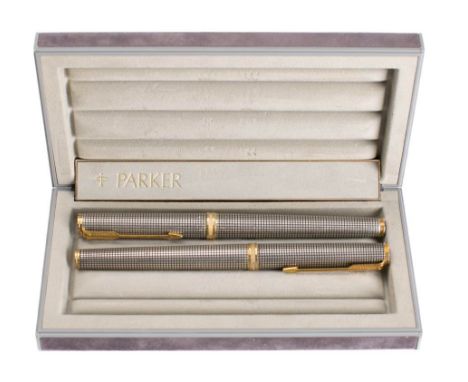 A Parker silver pen set in Chisel finish: fountain pen and roller ball (2) 