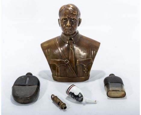 A brass bust of Adolf Hitler together with two hip flasks and a whistle