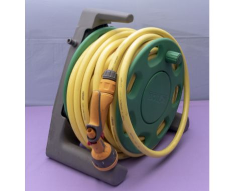 A Hazelock hose pipe and stand