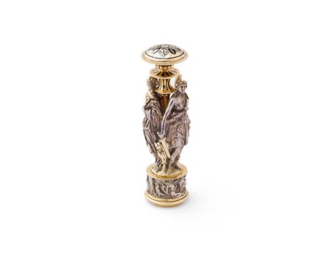 AN ENAMEL, SILVER AND GOLD FIGURAL DESK SEAL, CIRCA 1870 The domed terminal with black enamel decoration to both sides, the s