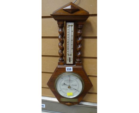 A vintage oak barometer thermometer Condition reports provided on request by email for this auction otherwise items purchased