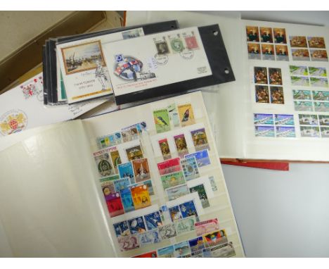 A blue, brown &amp; red modern album of mainly British &amp; Commonwealth stamps together with a boxed collection of first da