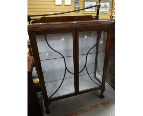 A vintage two-door china cabinet Condition reports provided on request by email for this auction otherwise items purchased `a