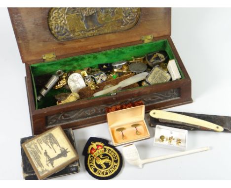 A vintage carved wooden box containing large quantity of intriguing collectables, militaria, coins &amp; jewellery ETC Condit