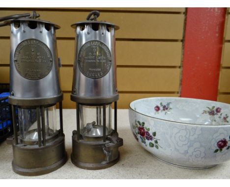 Two reproduction miner's lamp and a floral decorated bowl Condition reports provided on request by email for this auction oth