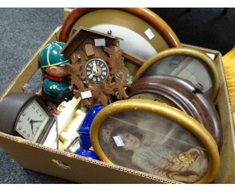 Box of mixed items including Bakelite clock, cuckoo clock, prints ETC Condition reports provided on request by email for this
