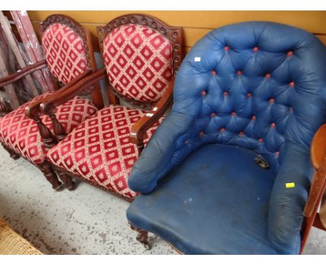 An antique button back blue upholstered armchair and a pair of carved armchairs with padded seats and backs Condition reports