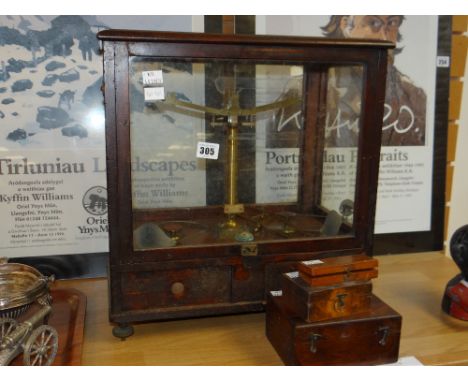 A vintage cased chemist's scales by Oertling of London together with boxed weights Condition reports provided on request by e