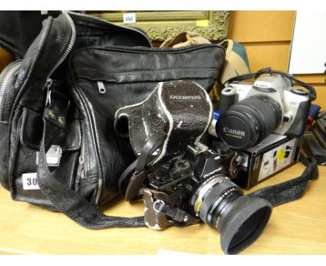 Parcel of vintage cameras including Olympus Om-1, Canon, Digital Cybershot Condition reports provided on request by email for