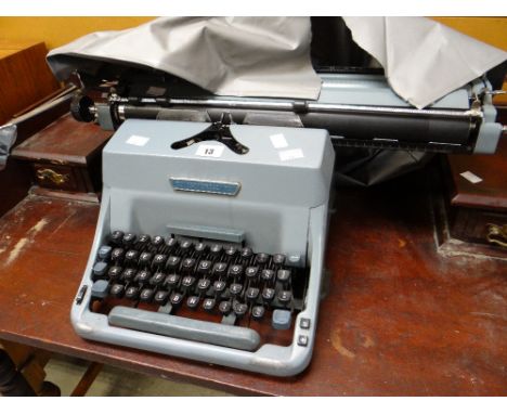 An Imperial 70 vintage typewriter Condition reports provided on request by email for this auction otherwise items purchased `