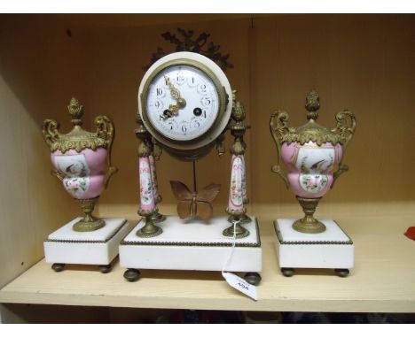 A 19th century French clock garniture, the drum case enclosing 8-day bell striking movement faced by florally painted enamel 