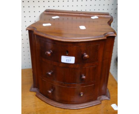 A Victorian mahogany three drawer trinket chest