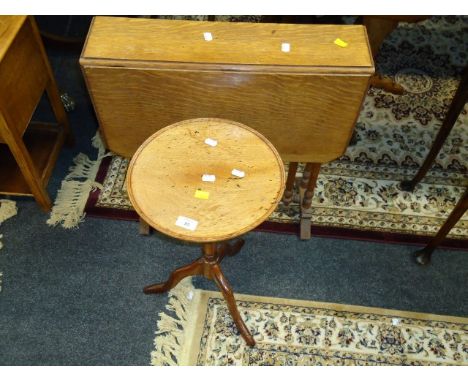 An Edwardian oak Sutherland table, a c1900 mahogany tripod wine table and an oak sewing box