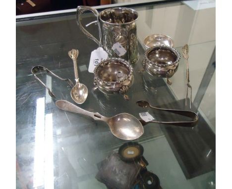 A small mixed lot of silver, including a 19th century mug (unmarked), pair of bun salts, pair of pin dishes, two pairs of sug