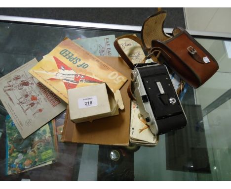 Mixed lot including folding camera, cigarette cards, risque playing cards etc