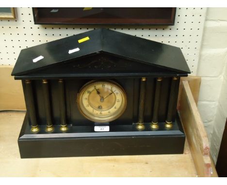 An early 20th century Belgian black marble 8 day mantel clock, of architectural temple form, with gilt metal mounted pillars,