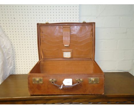 A vintage pig skin vanity case, with fitted interior